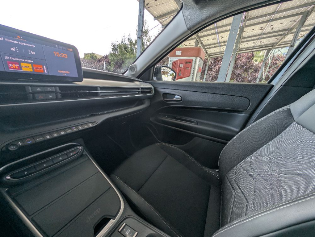 Jeep AVENGER 1.2 mHEV, najbogatsza wersja Summit - jak nowy - zdjęcie 12